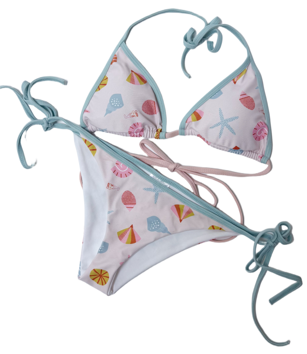 Matching family swimwear in tropical print