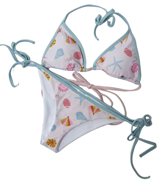 Matching family swimwear in tropical print